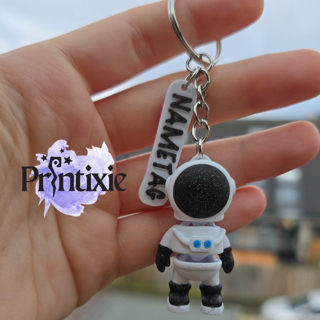 Tiny Astronaut keychain with nametag 3D Printed - Made by Printixie