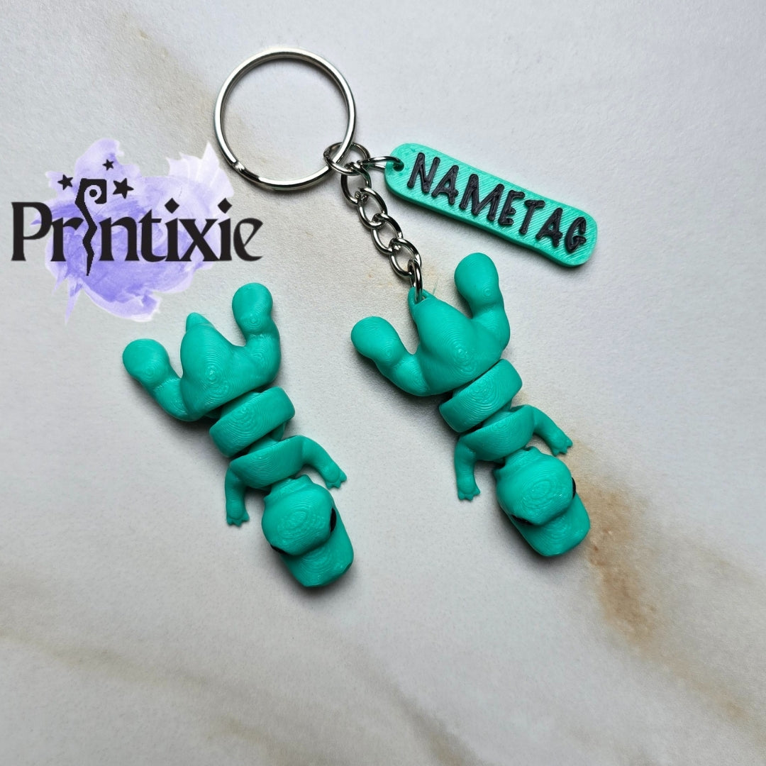 Trex Minixie and keychain with nametag