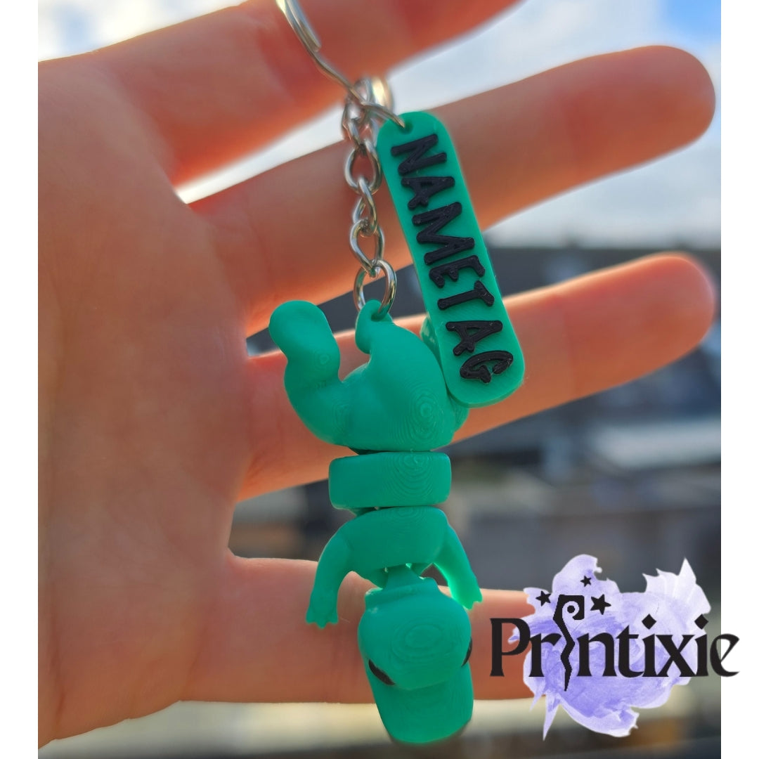 Trex Minixie keychain with nametag