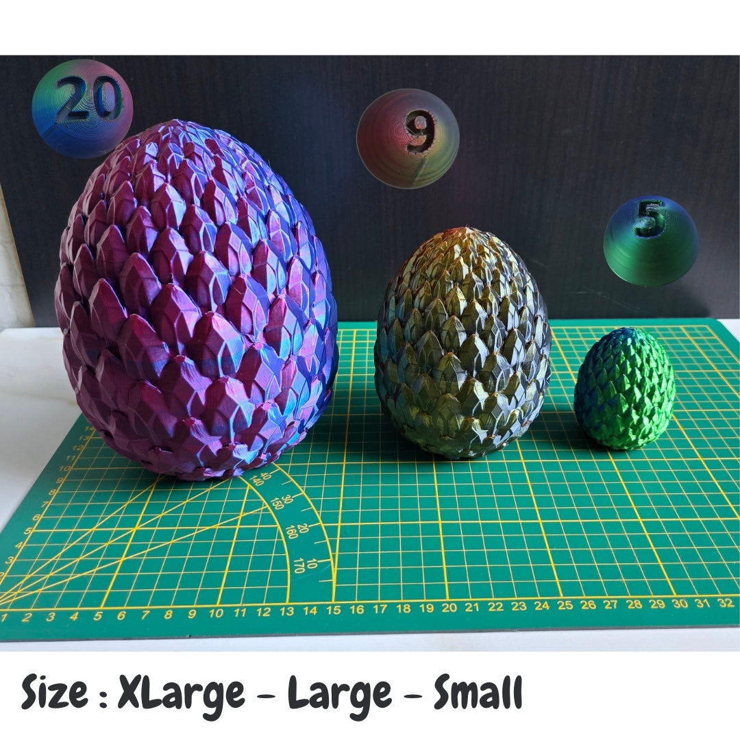 Shiny 3D printed fantasy dragon egg models in three sizes and colors