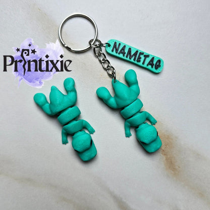 Trex Minixie and keychain with nametag